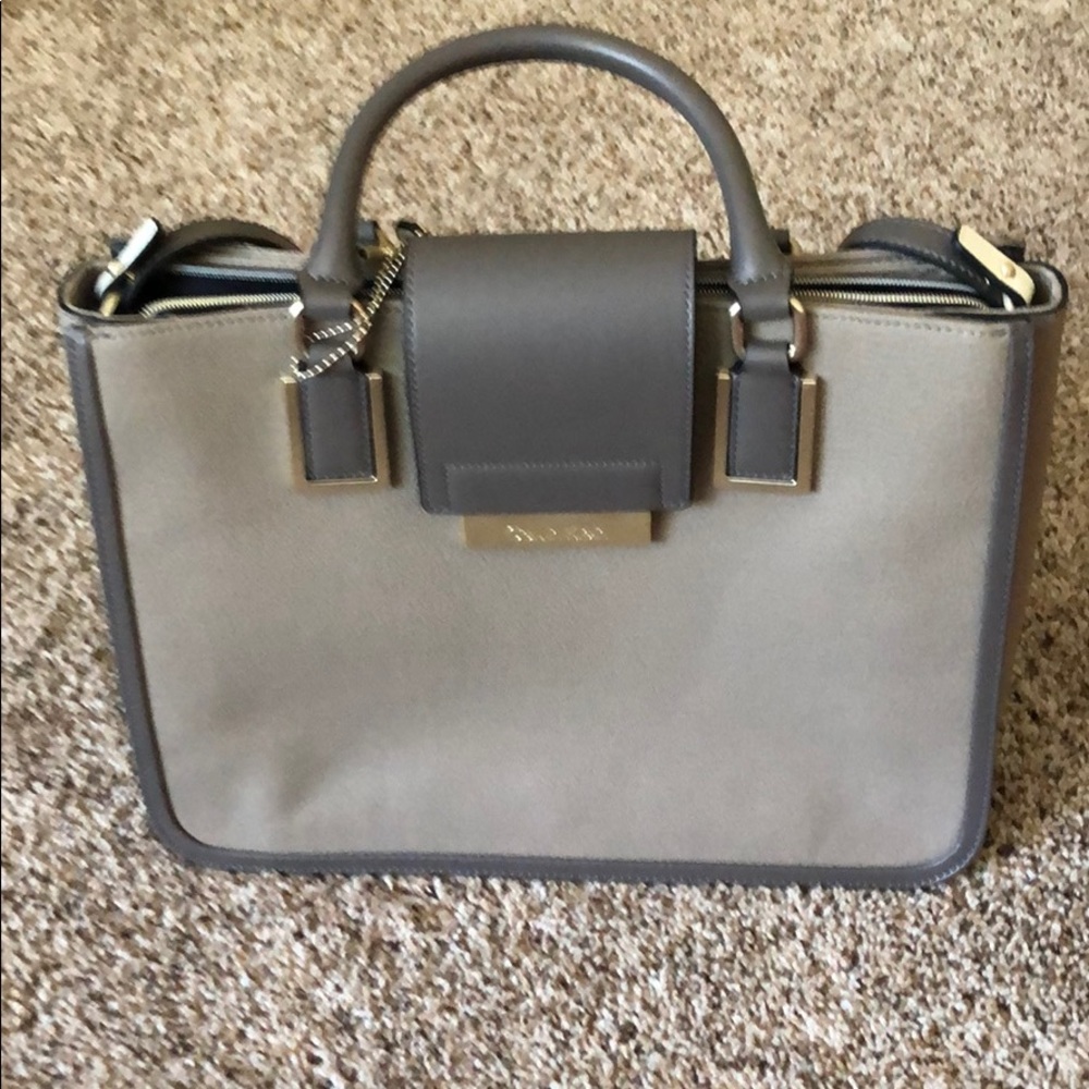 Brand new! Multiple pocket purse.